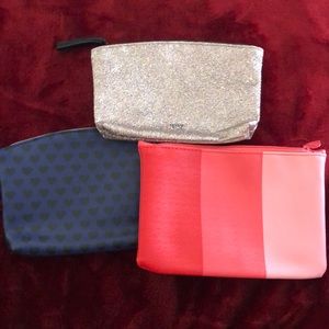 Three small makeup (Ipsy) bags